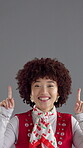 Retro, pointing and fashion with face of woman in studio for vintage news, announcement and groovy space. Mockup, notification and indie aesthetic with person on gray background for show or giveaway