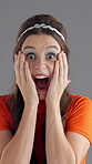 Vintage, surprise and fashion with face of woman in studio for retro news, announcement and groovy style. Excited, shock and indie aesthetic with person on gray background for wow, secret or giveaway