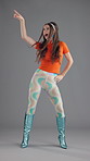 Girl, dancer and retro fashion in studio with laughing, confidence and face for disco party by background. Woman, happy and portrait with funky rhythm, celebration and vintage style for event in USA