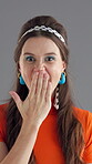 Retro, shock and fashion with face of woman in studio for vintage news, announcement and groovy style. Excited, surprise and indie aesthetic with person on gray background for wow, secret or giveaway