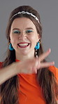 Face, woman and dancer for retro fashion, happiness and confidence with groovy movement on gray background. Smile, portrait and female person with dancing, vintage style or funky energy in studio