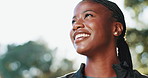 Thinking, hiking and black woman in forest, sunshine and smile with decision, daydreaming and wellness. African person, outdoor or hiker in woods, lens flare or journey with nature, travel or fitness