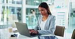 Laptop, typing and business woman with financial email, performance analytics and metrics online. Reading, computer and worker writing report for data analysis, stats and investment trends in office