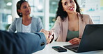 Business people, shaking hands and celebrate success with technology at interview in office. Announcement, women and man for handshake in corporate workplace for agreement, hiring or applause in pov