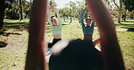 Yoga, people or instructor stretching at park with arm warm up for core strength, holistic healing or posture guidance. Pilates, yogi or class with workout in nature for fitness or spiritual wellness