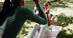 Woman, personal trainer and high five at park with sit up on exercise mat, support or training for strong core. Girl, coach and workout for muscle, abs or fitness with celebration for goals in nature