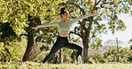 Outdoor, meditation and woman with fitness, wellness and energy with morning, routine and nature. Mental health, yogi and person in park, stretching and exercise with balance, stress relief and calm