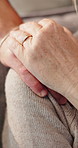 Hands, closeup and senior person with caregiver for comfort, support and compassion. Volunteer, touching shoulder for help and kindness with empathy, console for grief or loss with elderly care