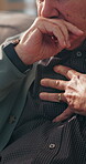 Senior man, chest pain and hands with cough for lung infection, respiratory illness and disease in home. Closeup, elderly person and symptoms of medical crisis with heart failure, discomfort or virus