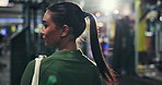 Gym, fitness and woman walk with back for arrival, start exercise or think of practice for workout. Athlete, female person and enter sports club for body health, wellness or bodybuilder fix ponytail