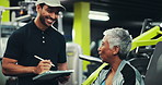 Gym, woman and personal trainer with tablet, talking and explanation for training service and smile. Health club, people and review of consent form with instructor, fitness and happy for schedule