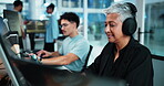 Woman, programmer and headphones with computer in office for IT, listen to music and software update. Mature person, pc and streaming audio for web development, reading information and code debugging