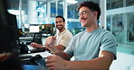 Night, man and programmer at computer with fist pump, work achievement and team support in coworking space. Coder, excited and gesture in office for successful code run, reached deadline or good news