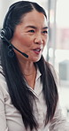 Call center, talking and happy Asian woman at help desk for customer service, assistance and contact us. Support agent, mature and conversation with client for advice, feedback and faq for query
