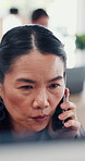 Asian woman, phone call and conversation on computer for business negotiation or insurance deal in office. Mobile, talking and communication with mature manager for policy sales, question or feedback