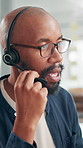 Call center, talking and glasses with business black man for travel agent, trip advisor and customer support. Contact us, flight help desk and tourism guide agency with person in office for advice
