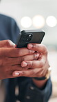 Hands, business and man typing with phone in office of communication, social media and message. Closeup, male person and mobile for chat with contact, reading email and information with notification