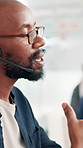 Communication, contact us and headset with black man in call center for advice or support. Consulting, customer service and microphone with agent in workplace as virtual assistant for online feedback