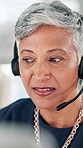 Call center, office and mature business woman for online help, consulting and CRM support. Professional, virtual assistant and person with headset for customer service, contact us and communication