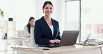 Laptop, face and happy business woman in office for research or typing email for insurance. Computer, corporate worker and portrait with smile for risk management, financial policy and coworking