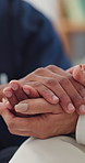 Nurse, home and holding hands of woman for empathy, support and comfort with cancer diagnosis. Medical caregiver, closeup and kindness with senior patient for help, sympathy and compassion with hope