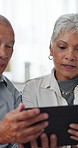 Mature couple, smile and tablet with app on sofa in living room of home together for social media. Love, relax or streaming with happy man and woman in apartment for relationship, romance or wellness