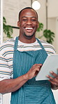 Man, barista and tablet with face at cafe with smile, pride and job with catering service at restaurant. African person, waiter or business owner on touchscreen, app or happy at coffee shop in Kenya
