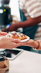 Hands, person and giving food at cafe for client order, customer service and collect meal. People, waitress and serving coffee and purchase for breakfast, hospitality industry and consumer checkout 