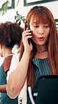 Phone call, woman and barista in coffee shop with order, delivery or food service in restaurant. Happy, cellphone and female waitress on mobile discussion with reservation for catering in cafeteria.