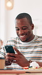 Laughing, phone and black man in coffee shop online for social media, message and internet. Cafeteria, restaurant and person on smartphone for connection, networking and mobile app for communication