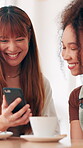 Friends, phone and women laugh at cafe for social media post, online joke and hangout. Relationship, girls and happy with technology for meme, coffee date and connection for internet gossip or talk