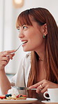 Food, eating and woman with breakfast in cafe with waffle for hospitality service at restaurant. Brunch, sweet and female person enjoying pancakes, fruit and cream with caffeine latte in coffee shop.