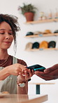 Woman, smartphone and pos at cafe for payment, order and easy transaction for catering service at restaurant. People, customer and phone with smile, tap and fintech with mobile app at coffee shop