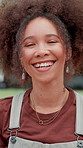 Face, outdoor and woman with smile, funny and wind with university, confident personality and humor. Portrait, happy person and student in park, laughing and joke with breeze, break and education
