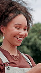 Happy, outdoor and woman laughing with funny, comic or comedy joke on social media with phone. Smile, nature and female person on cellphone with mobile app for goofy post online for humor in park.