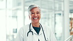 Doctor, woman and face with laughing in hospital for healthcare service, cardiology and medical support. Medicine, flare and mature person with health career for professional treatment and about us