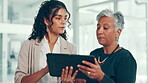 Collaboration, feedback and tablet with business people in office lobby for discussion or planning. Conversation, meeting or review with employee and manager in workplace for project management