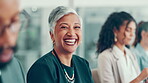 Face, laughing and seminar with business woman in office for conference, convention or development. Corporate, funny and presentation with mature employee in professional workplace for learning