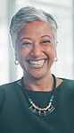 Happy, laughing and face of mature businesswoman in office with confidence for finance career. Smile, professional and portrait of female investment banker from Brazil with pride in workplace.