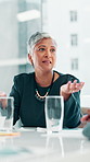 Business, meeting and woman in office for discussion, campaign planning or explain agenda with team. Mature project manager, people and talk in boardroom for information, company feedback or strategy