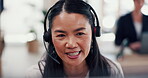Business woman, consultant and talking with headset for online communication at call center. Female person, agent or virtual assistant with mic on computer for CRM, web advice or help at workplace