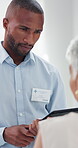 Talking, man and doctor with patient, tablet and explaining results of test, clinic and digital records. Hospital, medical professional and senior person with tech for diagnosis, healthcare or online