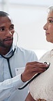 Doctor, stethoscope and senior woman with lung checkup, breathing and exam in hospital. Heart beat, listening and medical professional with cardiology test for healthcare, wellness and assessment