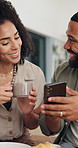 Breakfast, mobile and couple talking in home for social media post, show app and video on food blog. Phone, happy man and woman with morning meal, coffee and scroll website with news on internet