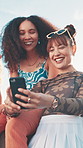 Girl, friends and laughing with phone together for streaming funny video, online gossip and comic social media post. Gen z people, smartphone and happy outdoor for relax, internet browsing or bonding