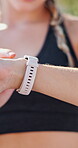 Athlete, hands and check time on smart watch outdoor for pace tracking, workout progress or results. Fitness, woman and stopwatch at park for performance metrics, monitor exercise and running speed