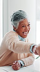 Applause, fist bump and wink with business woman in office for celebration of milestone or success. Funny, goals and target with mature employee laughing in workplace for achievement or motivation