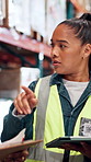 Woman, contractor and meeting with tablet at warehouse for logistics, supply chain or distribution. Female person, employee or talking with team or technology for inventory, stock or storage control