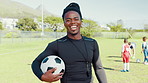 Happy man, face or soccer coach with ball on grass field for sport training, match or game. Portrait, male person or football trainer with children, kids or smile for physical activity or development