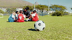Soccer, strategy or training with children and coach outdoor on field for planning or tactics. Fitness, football and sports with group of kids on grass pitch for community, exercise or team building